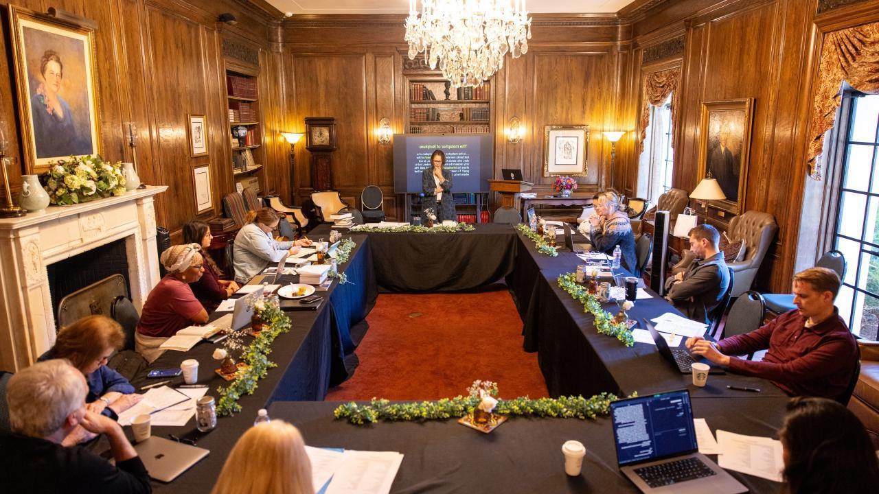 wide shot of certificate of leadership group in session